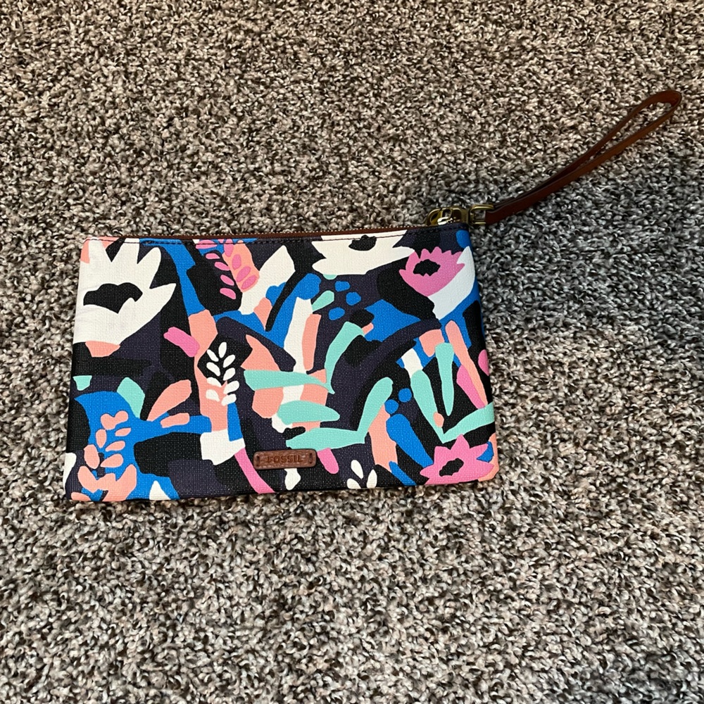 Fossil clutch bag. Zippered pouch with wristlet strap. Multicolor. Only used 1x.